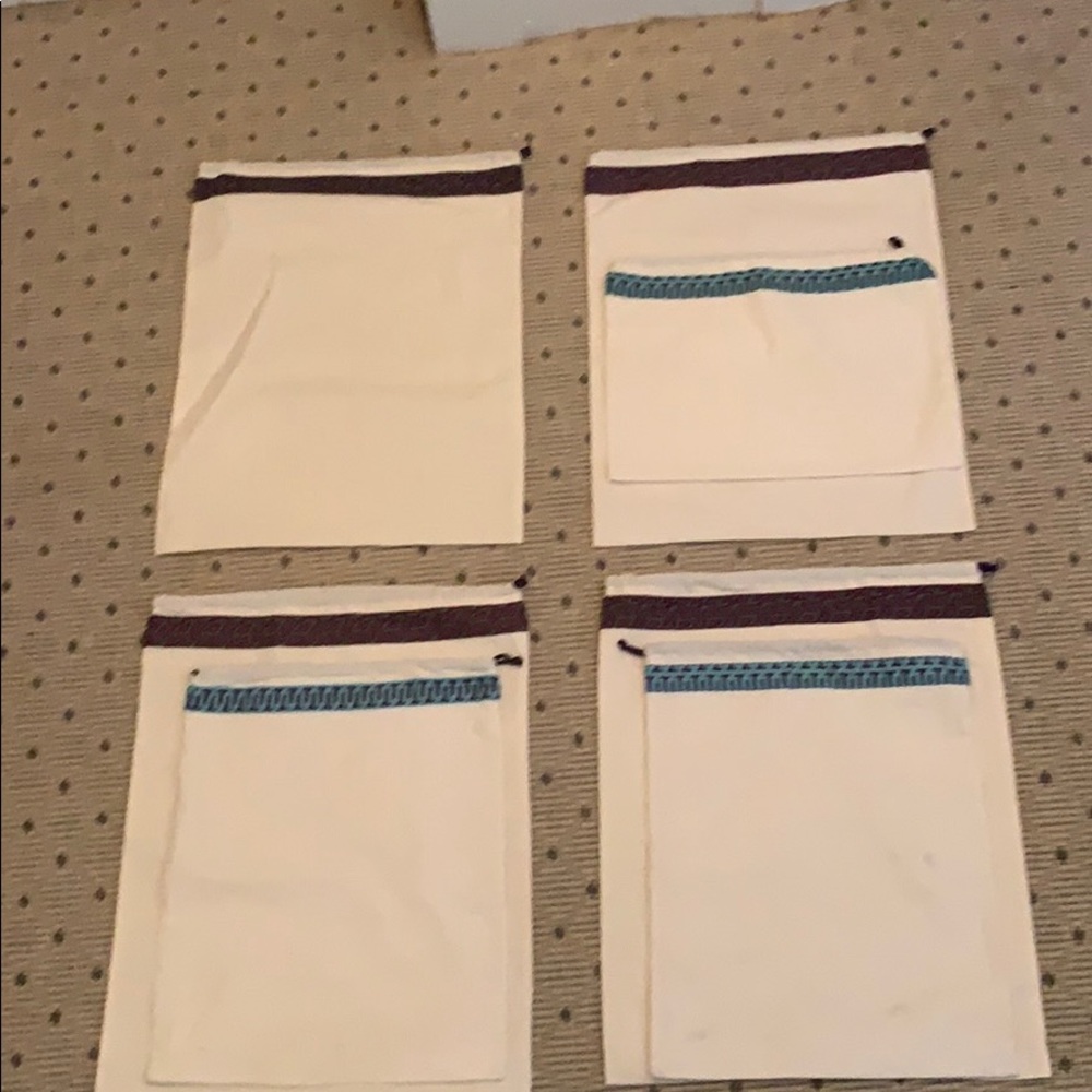 Tory Burch dusters WITHOUT GOLD EMBLEM.